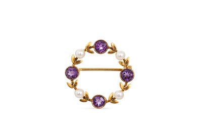Lot 133 - A PEARL AND AMETHYST CURCULAR BROOCH, of...