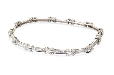 Lot 139 - A DIAMOND SET BRACELET, with 'X' motifs, the...