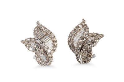 Lot 212 - A PAIR OF DIAMOND EARRINGS, round and baguette...