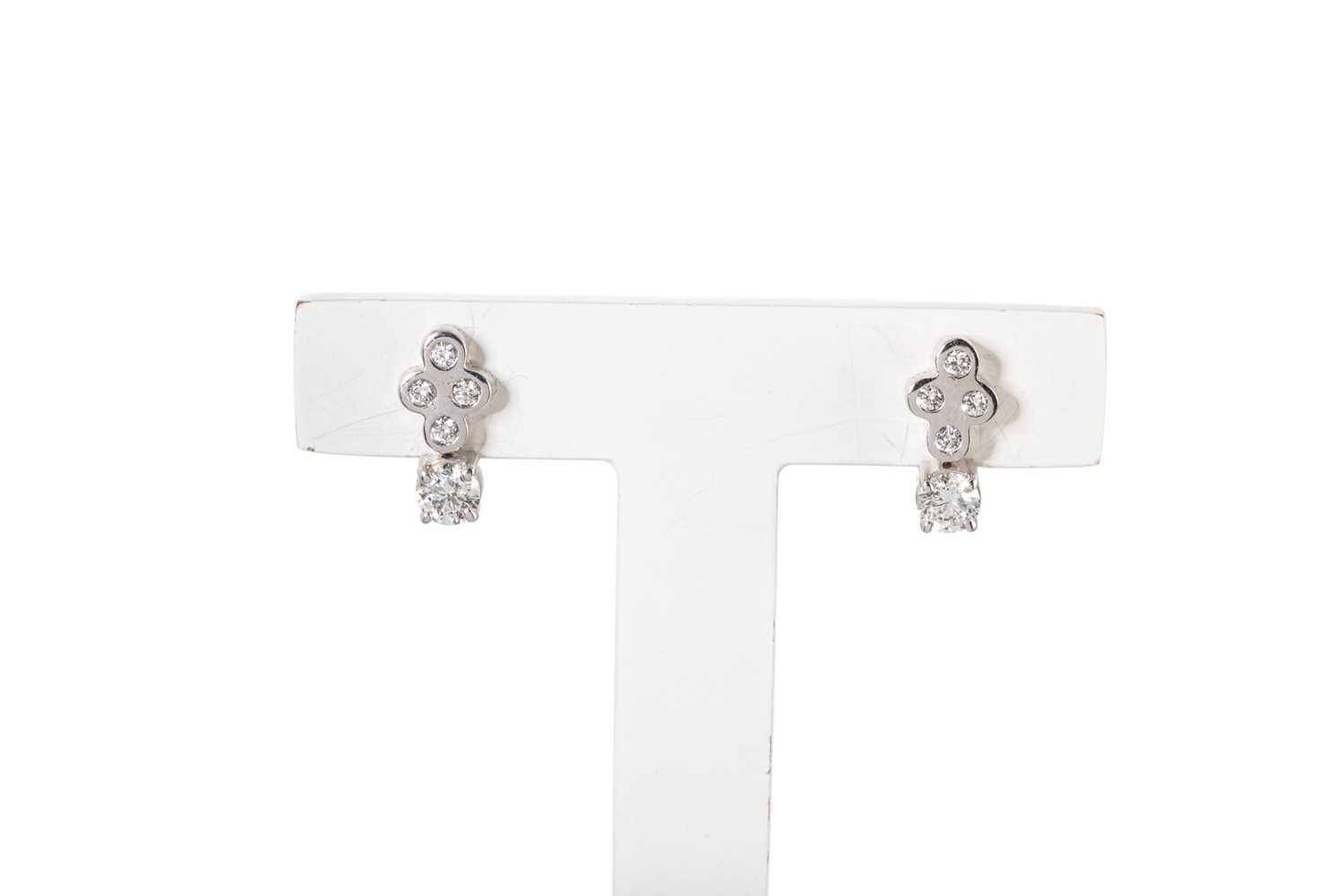 Lot 32 - A PAIR OF DIAMOND EARRINGS, mounted in 18ct...