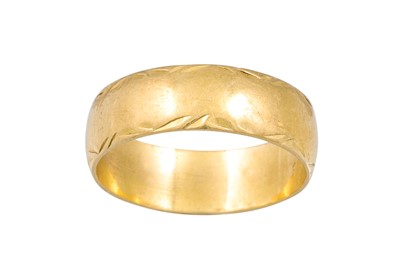 Lot 357 - AN 18CT YELLOW GOLD BAND, decoration to edge,...