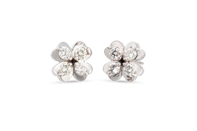 Lot 34 - A PAIR OF DIAMOND SET EARRINGS, of four leaf...