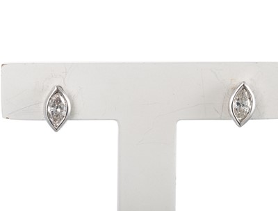 Lot 187 - A PAIR OF MARQUISE SET STUD EARRINGS, collet...