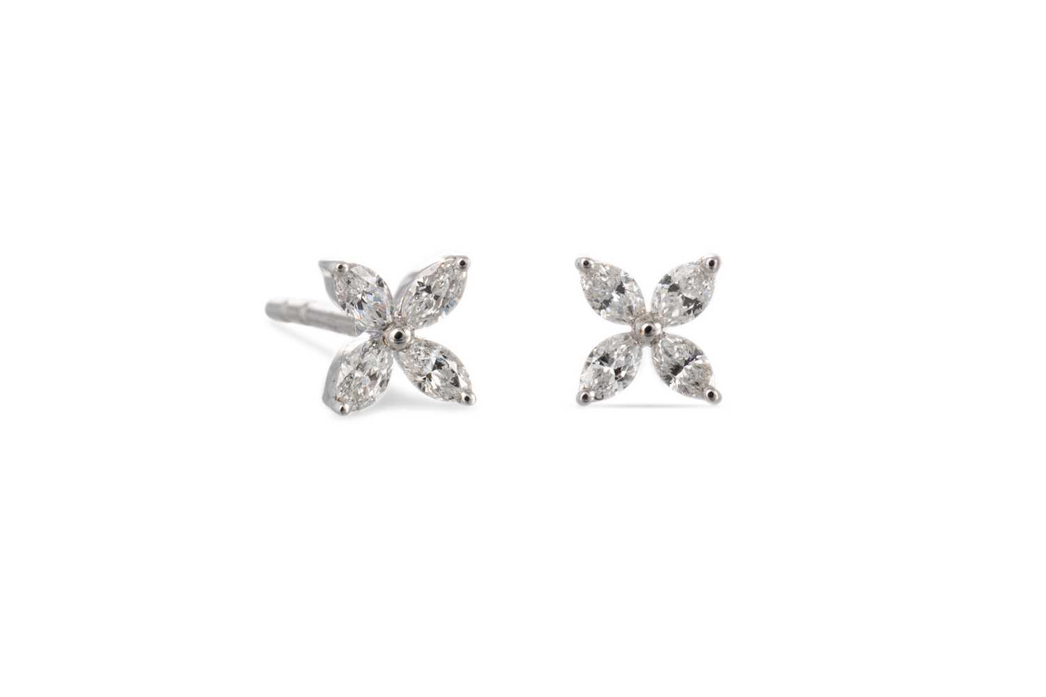Lot 36 - A PAIR OF DIAMOND SET EARRINGS, of floral form...