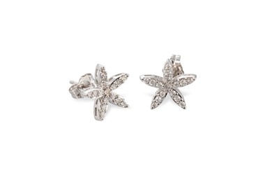 Lot 113 - A PAIR OF DIAMOND CLUSTER EARRINGS, of floral...