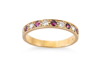 Lot 271 - A DIAMOND AND RUBY SET BAND RING, mounted in...