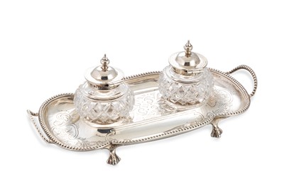 Lot 491 - A VICTORIAN SILVER MOUNTED TWIN BOTTLE CUT...
