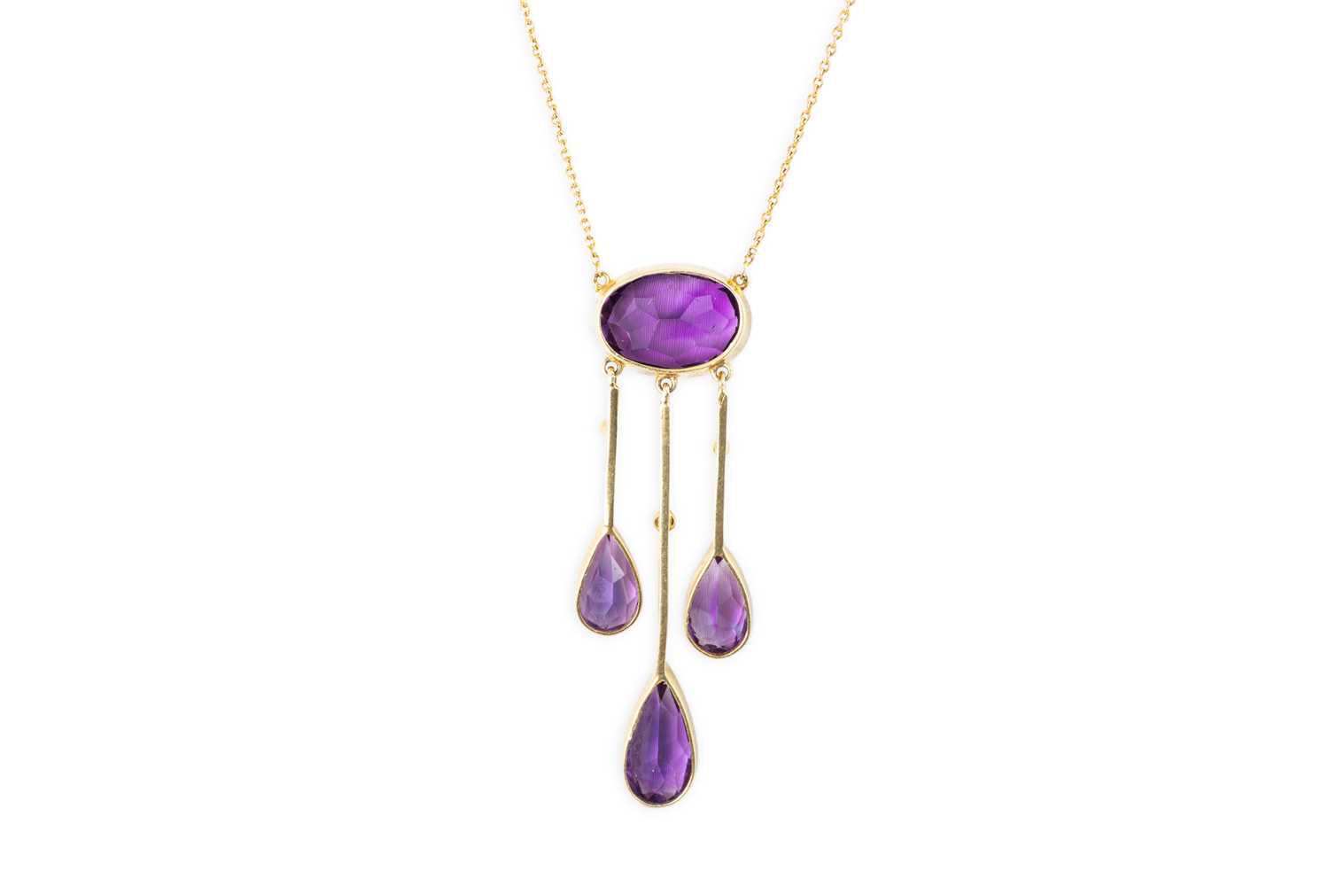 Lot 73 - AN ANTIQUE AMETHYST AND SEED PEARL DROP...