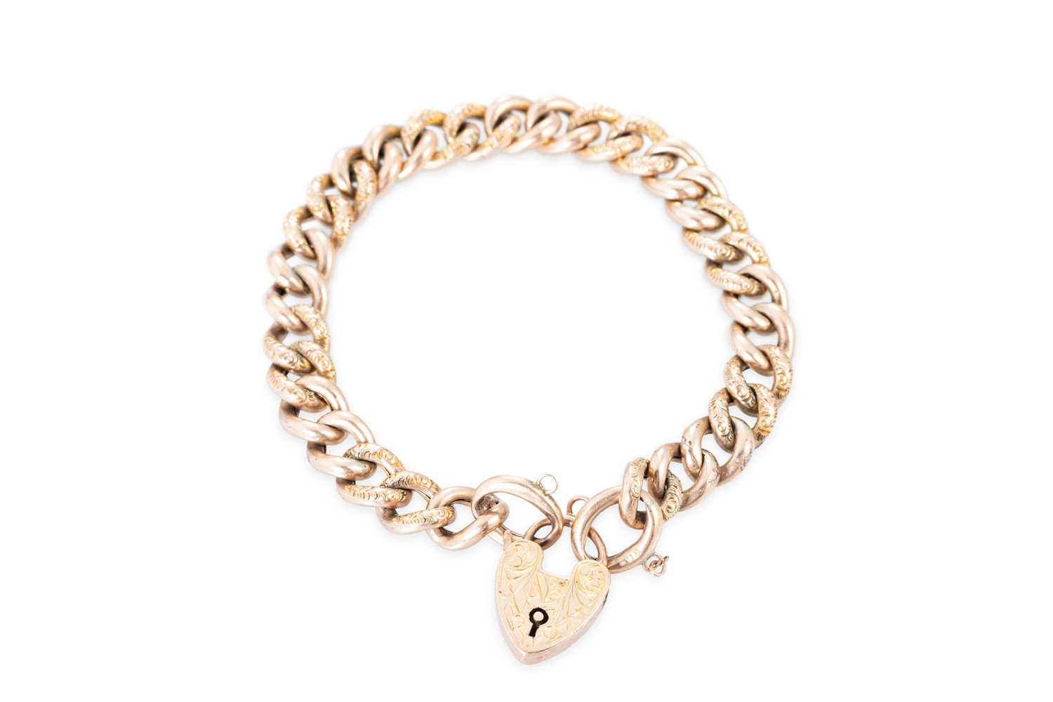 Lot 93 - AN ANTIQUE 9CT GOLD CURB LINK BRACELET,...