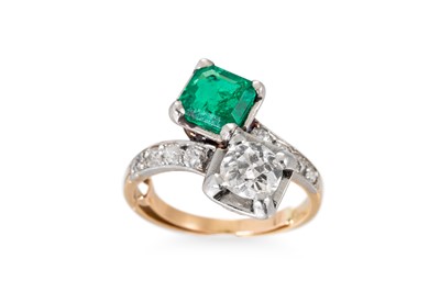 Lot 184 - AN ART DECO EMERALD AND DIAMOND TOI ET MOI...