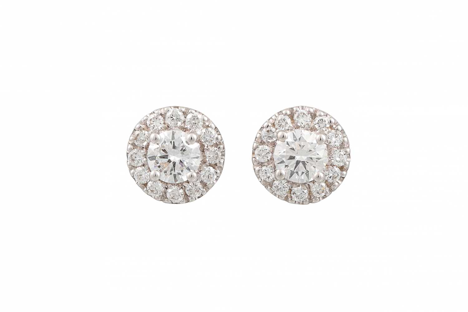 Lot 65 - A PAIR OF DIAMOND CLUSTER EARRINGS, set with...