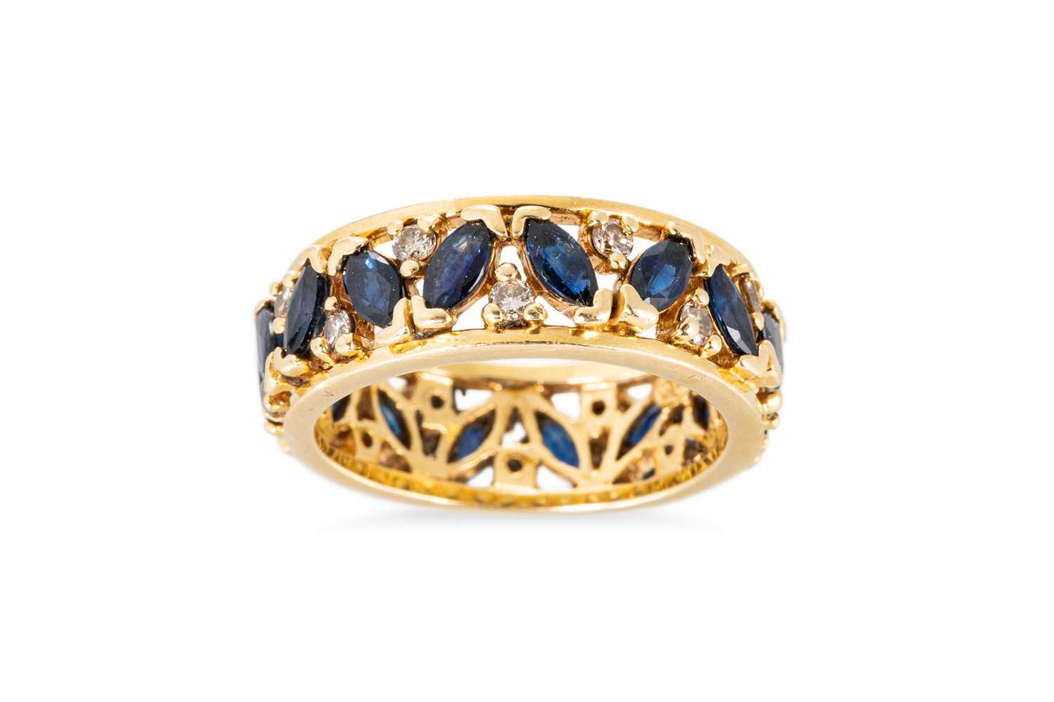 Lot 55 - A DIAMOND AND SAPPHIRE SET FULL BAND RING, the...