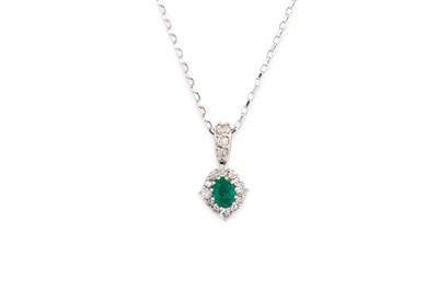 Lot 263 - AN EMERALD AND DIAMOND CLUSTER PENDANT, the...