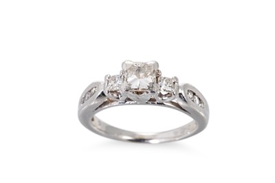 Lot 212 - A DIAMOND RING, the princess cut diamond to...