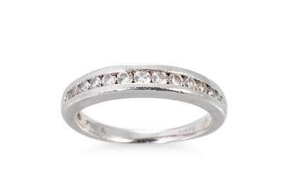 Lot 213 - A DIAMOND ETERNITY BAND, mounted in platinum....