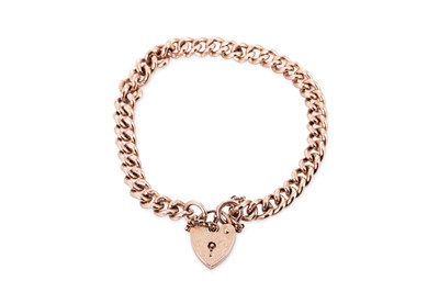 Lot 254 - A 9CT ROSE GOLD CURB LINK BRACELET, with...