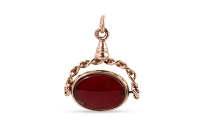 Lot 255 - A 9CT GOLD STONE SET SWIVEL FOB, carnelian inset