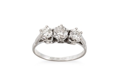 Lot 377 - A DIAMOND THREE STONE RING, mounted in 18ct...