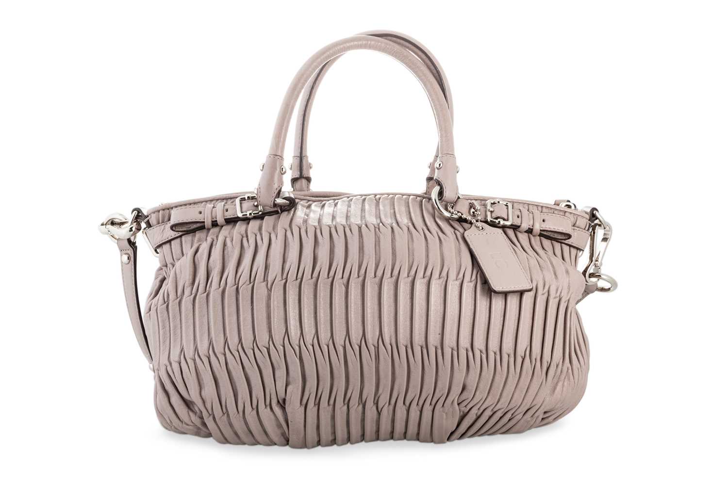 Lot 246 - A LADY'S COACH HANDBAG, mauve coloured leather,...