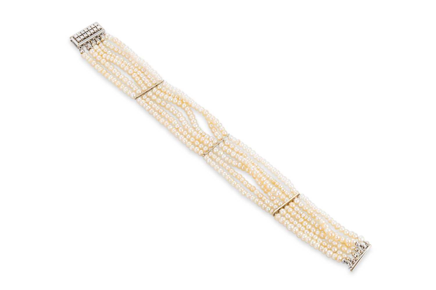Lot 85 - A VINTAGE SIX STRANDED SEED PEARL BRACELET,...