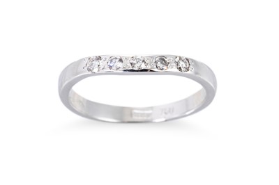 Lot 168 - A DIAMOND SET BAND RING, the round brilliant...