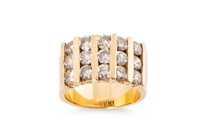 Lot 220 - A DIAMOND SET BAND RING, the round brilliant...