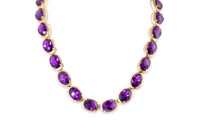 Lot 292 - AN AMETHYST SET NECKLACE, the mixed oval cut...