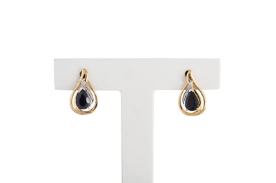 Lot 28 - A PAIR OF SAPPHIRE EARRINGS, the pear cut...