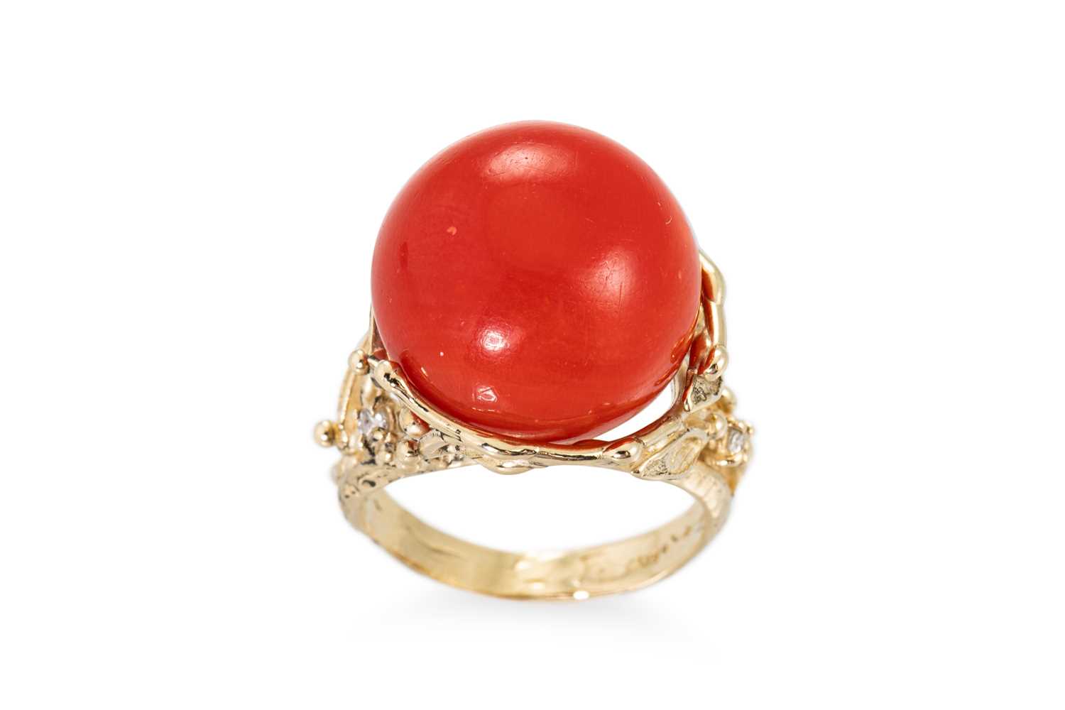 Lot 83 - A CORAL AND DIAMOND RING, of naturalistic form,...