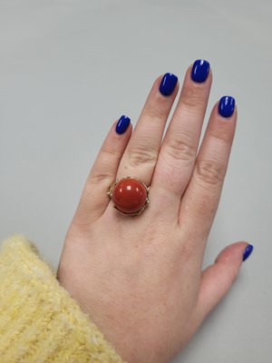 Lot 83 - A CORAL AND DIAMOND RING, of naturalistic form,...