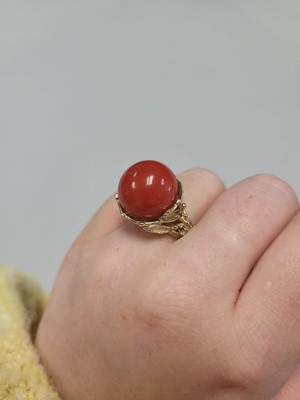 Lot 83 - A CORAL AND DIAMOND RING, of naturalistic form,...