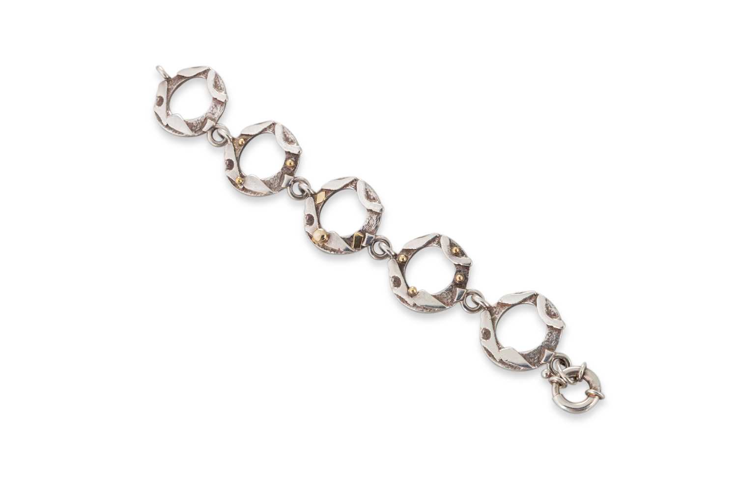 Lot 2 - A STERLING SILVER OPEN LINK BRACELET, by Niamh...