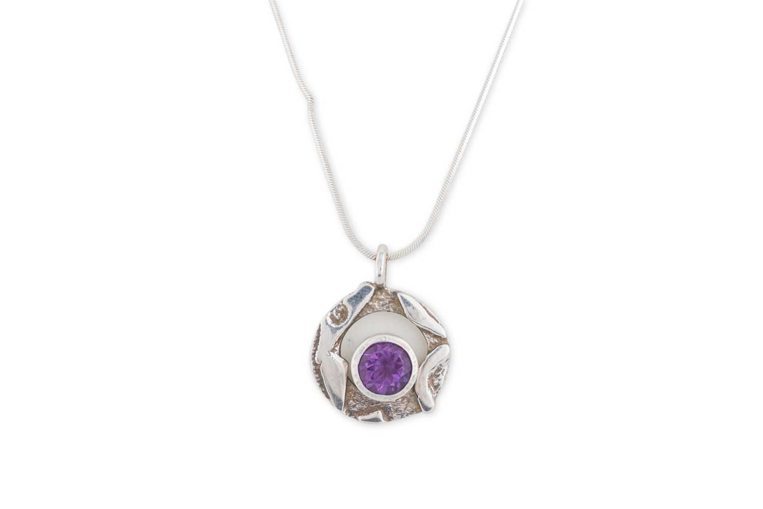 Lot 4 - A STERLING SILVER STONE SET PENDANT, by Niamh...