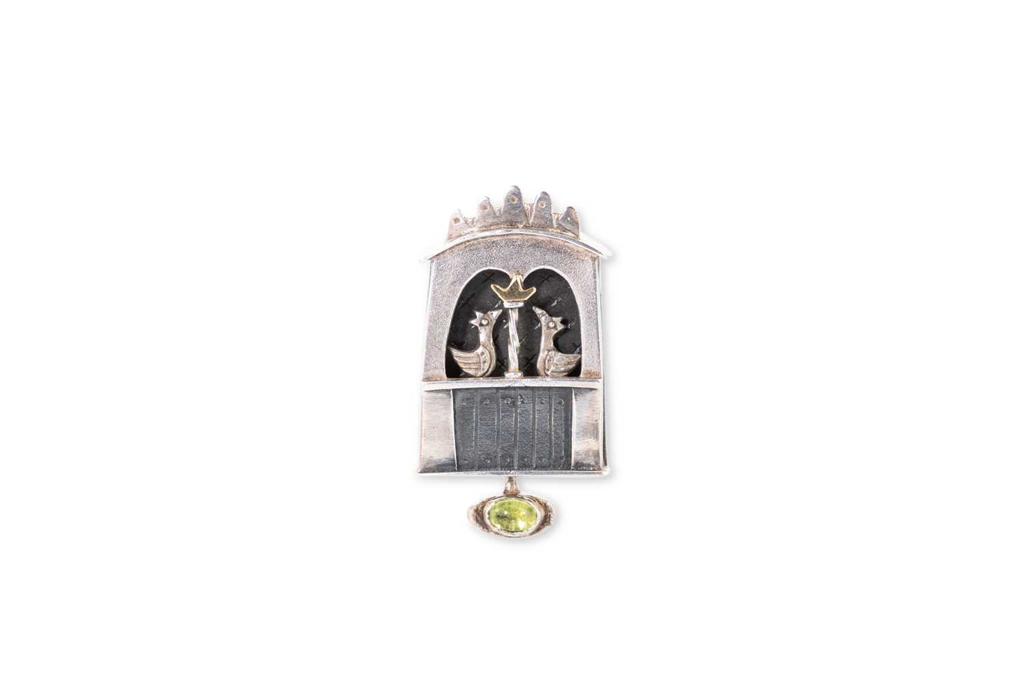 Lot 12 - A STERLING SILVER AND STONE SET BROOCH, by...