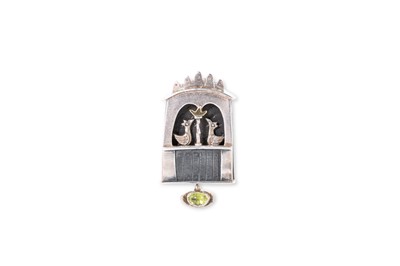 Lot 12 - A STERLING SILVER AND STONE SET BROOCH, by...