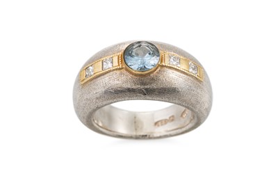 Lot 103 - A STERLING SILVER TOPAZ AND DIAMOND SET BOMBÉ...