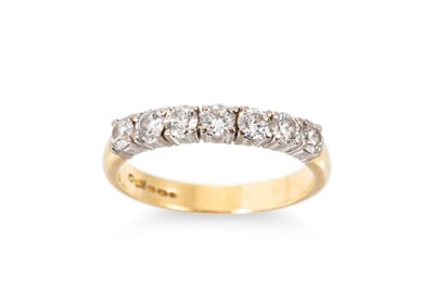 Lot 249 - A DIAMOND SEVEN STONE RING, the round...