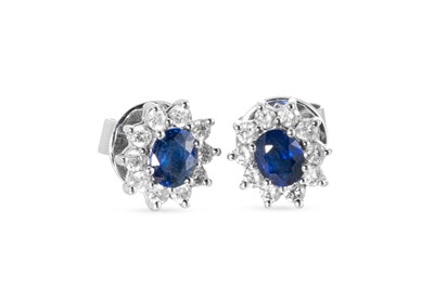 Lot 252 - A PAIR OF SAPPHIRE AND DIAMOND CLUSTER...