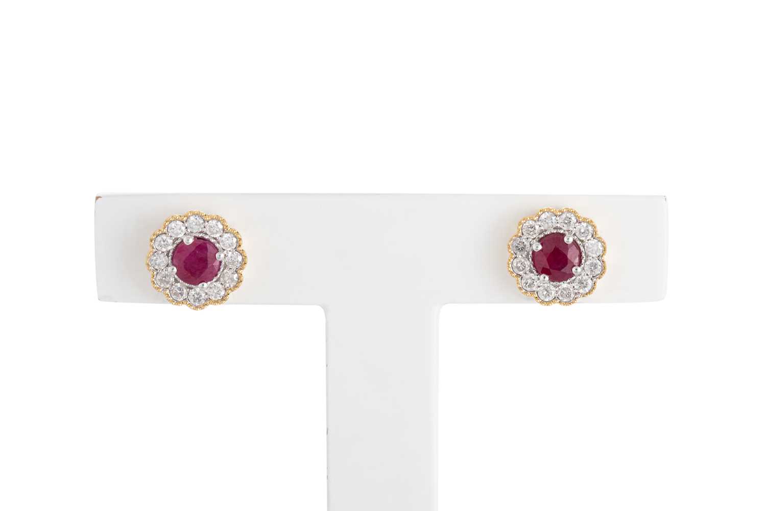 Lot 63 - A PAIR OF DIAMOND AND RUBY CLUSTER EARRINGS,...