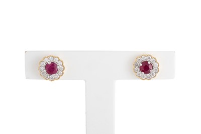 Lot 63 - A PAIR OF DIAMOND AND RUBY CLUSTER EARRINGS,...