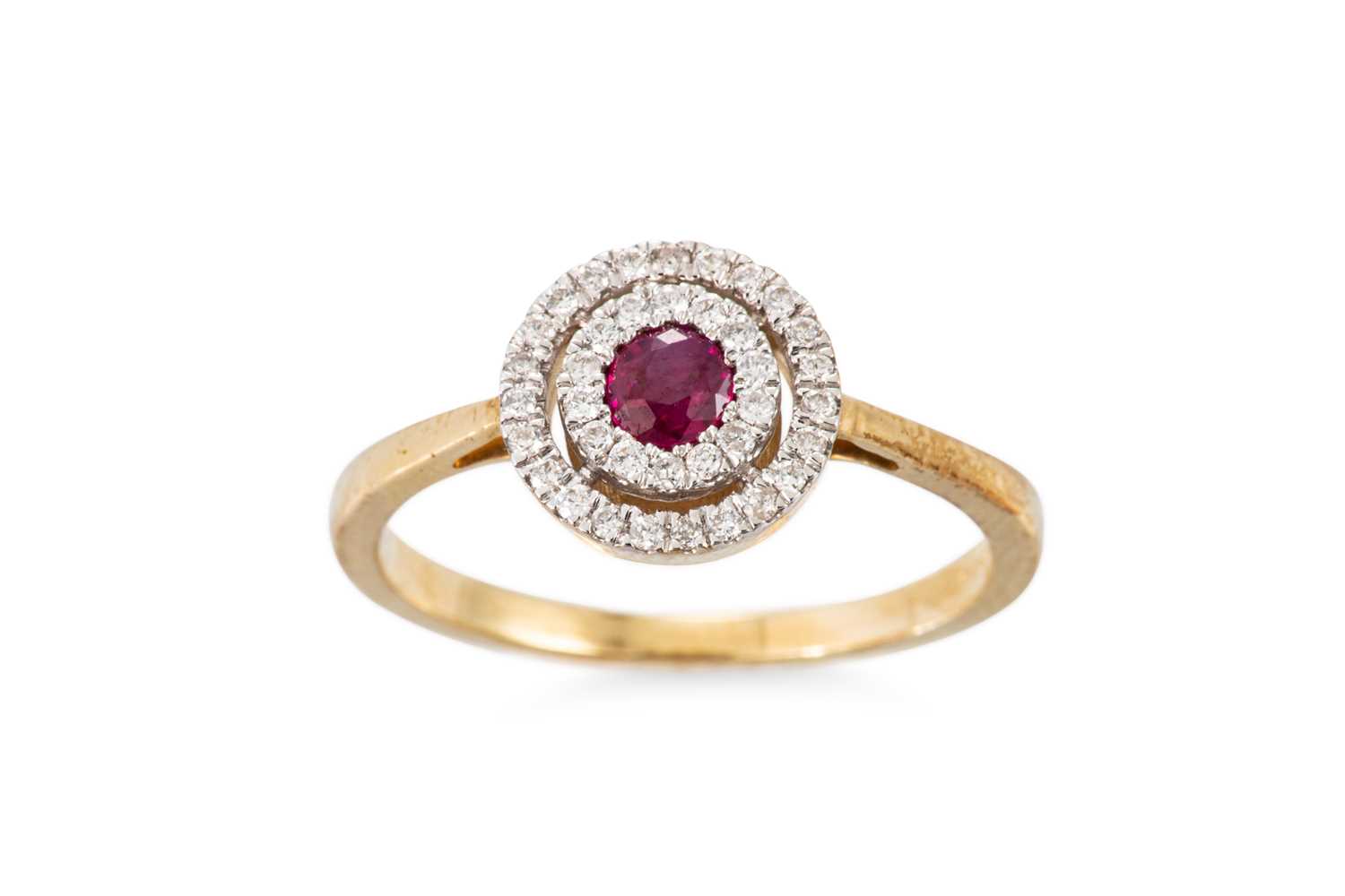Lot 70 - A DIAMOND AND RUBY TARGET RING, the central...