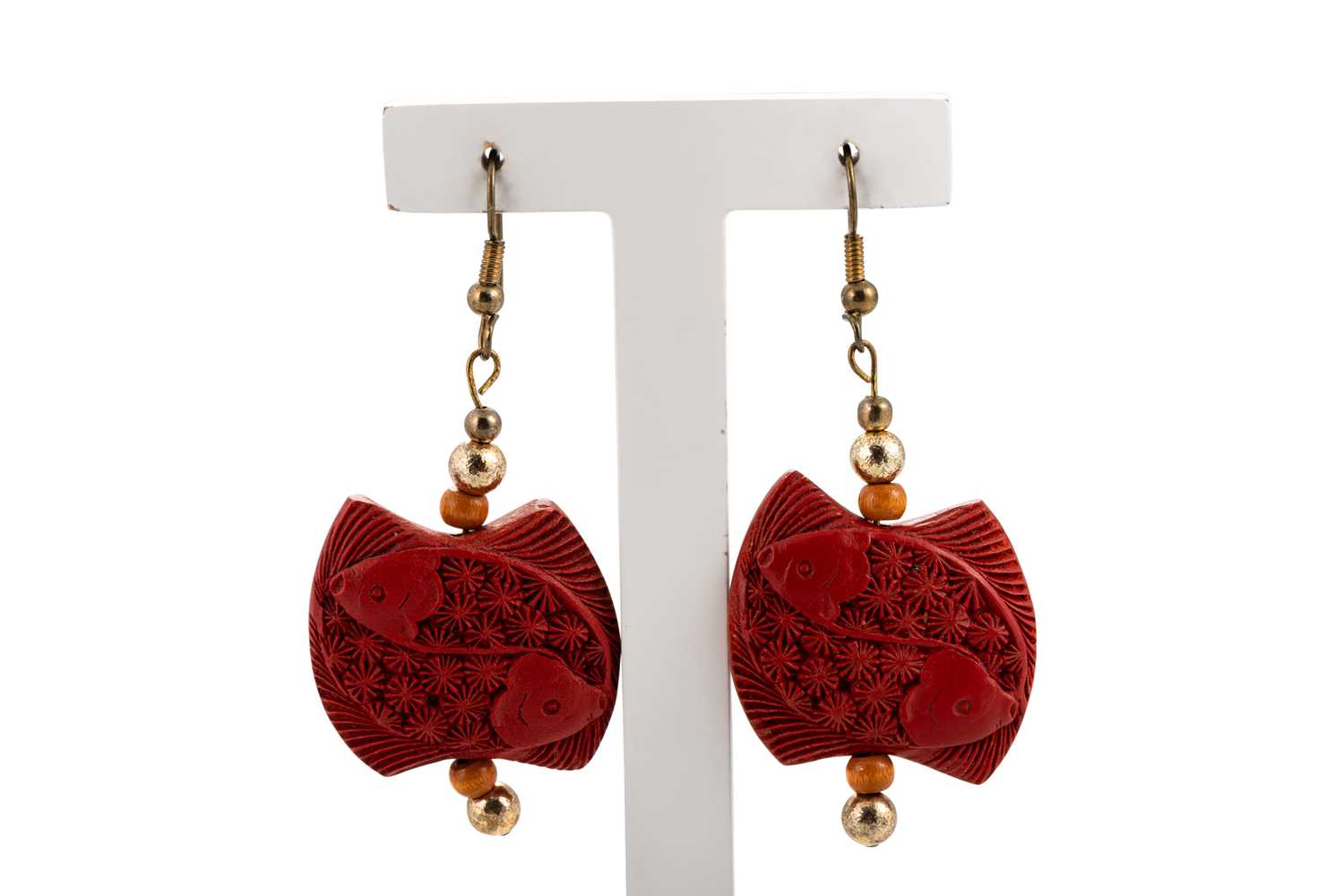 Lot 72 - AN ANTIQUE BANGLE, carved decoration, possible...