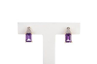 Lot 74 - A PAIR OF DIAMOND AND AMETHYST CLUSTER...