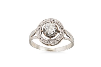 Lot 111 - A DIAMOND CLUSTER RING, the old cut diamonds...