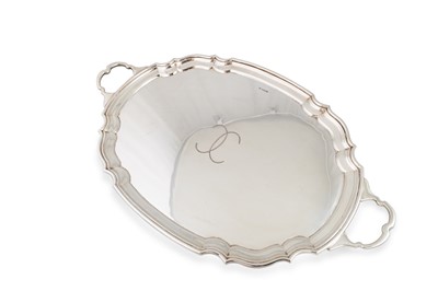 Lot 497 - A GEORGE V LARGE OVAL TWIN HANDLED SILVER...