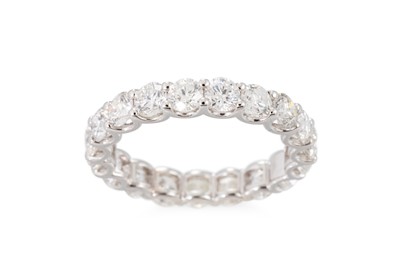 Lot 347 - A DIAMOND FULL BANDED ETERNITY RING, the round...