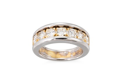 Lot 348 - A DIAMOND SET BAND RING, the round brilliant...