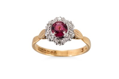 Lot 369 - A PINK TOURMALINE AND DIAMOND CLUSTER RING,...