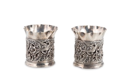 Lot 478 - A PAIR OF VICTORIAN SILVER BEAKERS, in rococo...