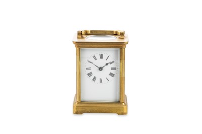 Lot 517 - AN EDWARDIAN BRASS FRAMED CARRIAGE CLOCK,...